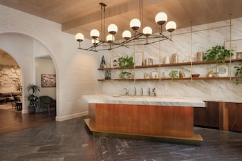 Hotel entrance and lobby at Halcyon - a hotel in Cherry Creek