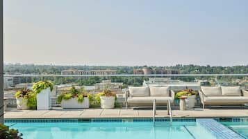 Outdoor pool, pool cabanas (surcharge), pool loungers