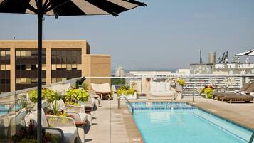 Outdoor pool, pool cabanas (surcharge), pool loungers