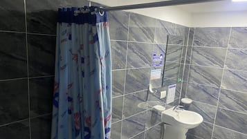 Family Room | Bathroom | Shower, free toiletries, towels, soap