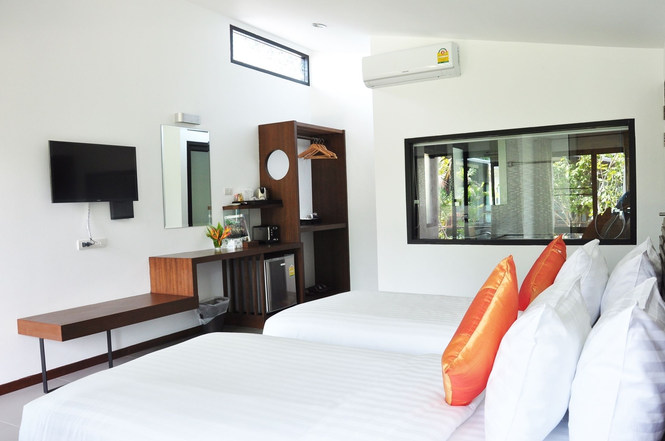 deluxe twin bed with garden view | blackout curtains, rollaway beds, free wifi