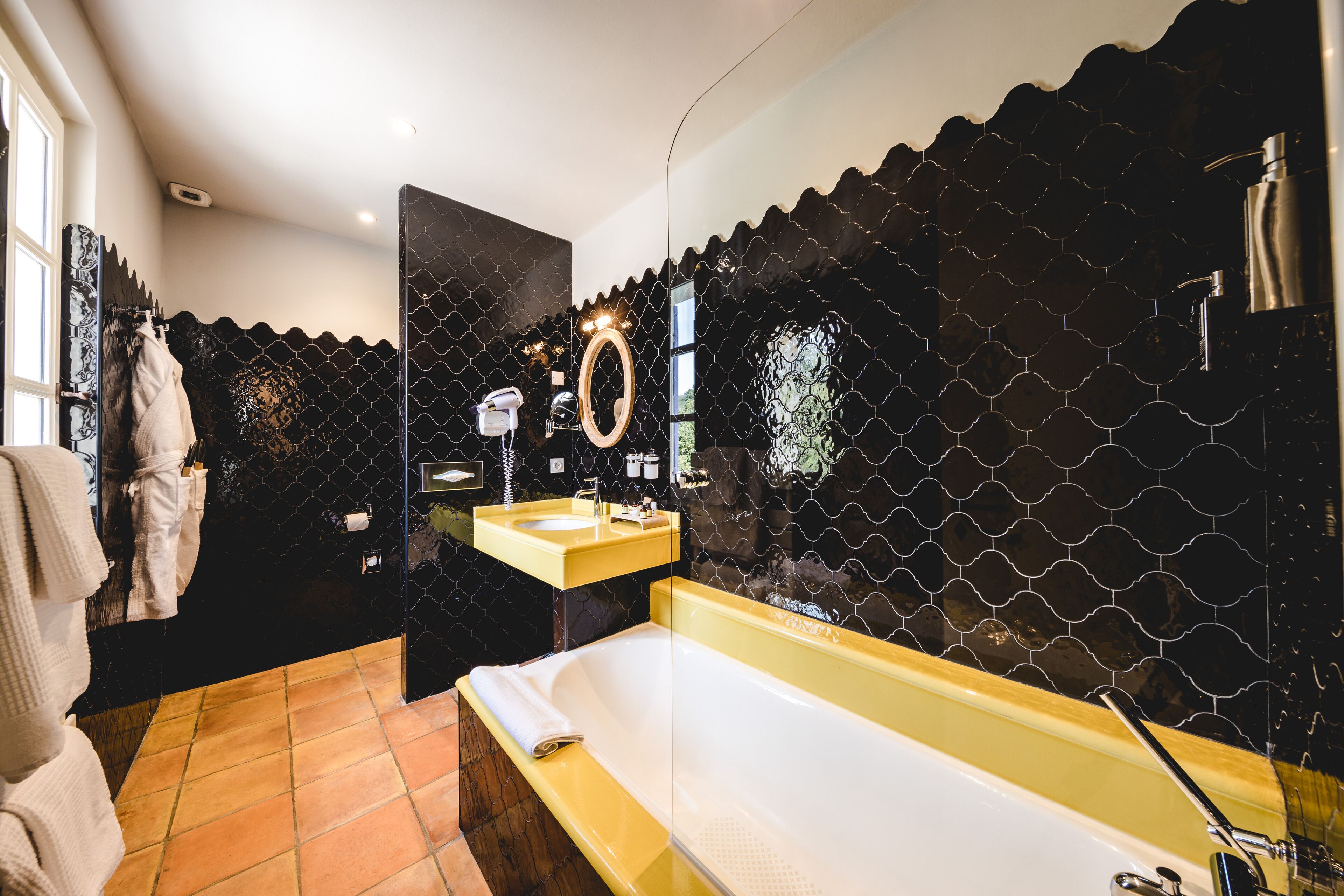 deluxe room | bathroom | free toiletries, hair dryer, bathrobes, slippers