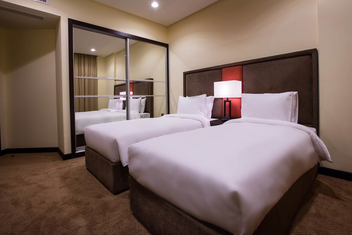 Suite Premium, 2 kamar tidur | Minibar, brankas, meja kerja, dan kedap suara