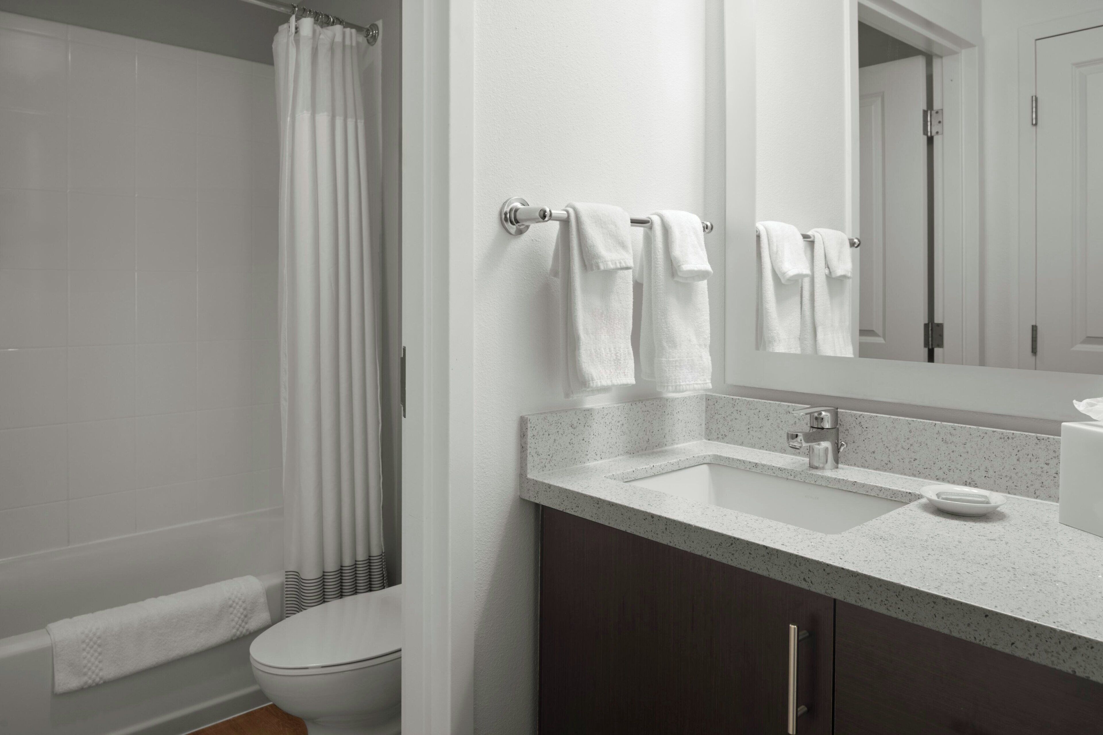 Hair dryer, towels, soap, shampoo