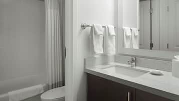 Hair dryer, towels, soap, shampoo