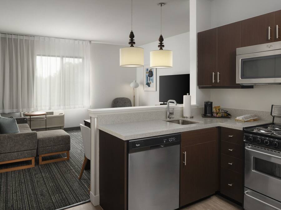 Full-sized fridge, microwave, stovetop, dishwasher