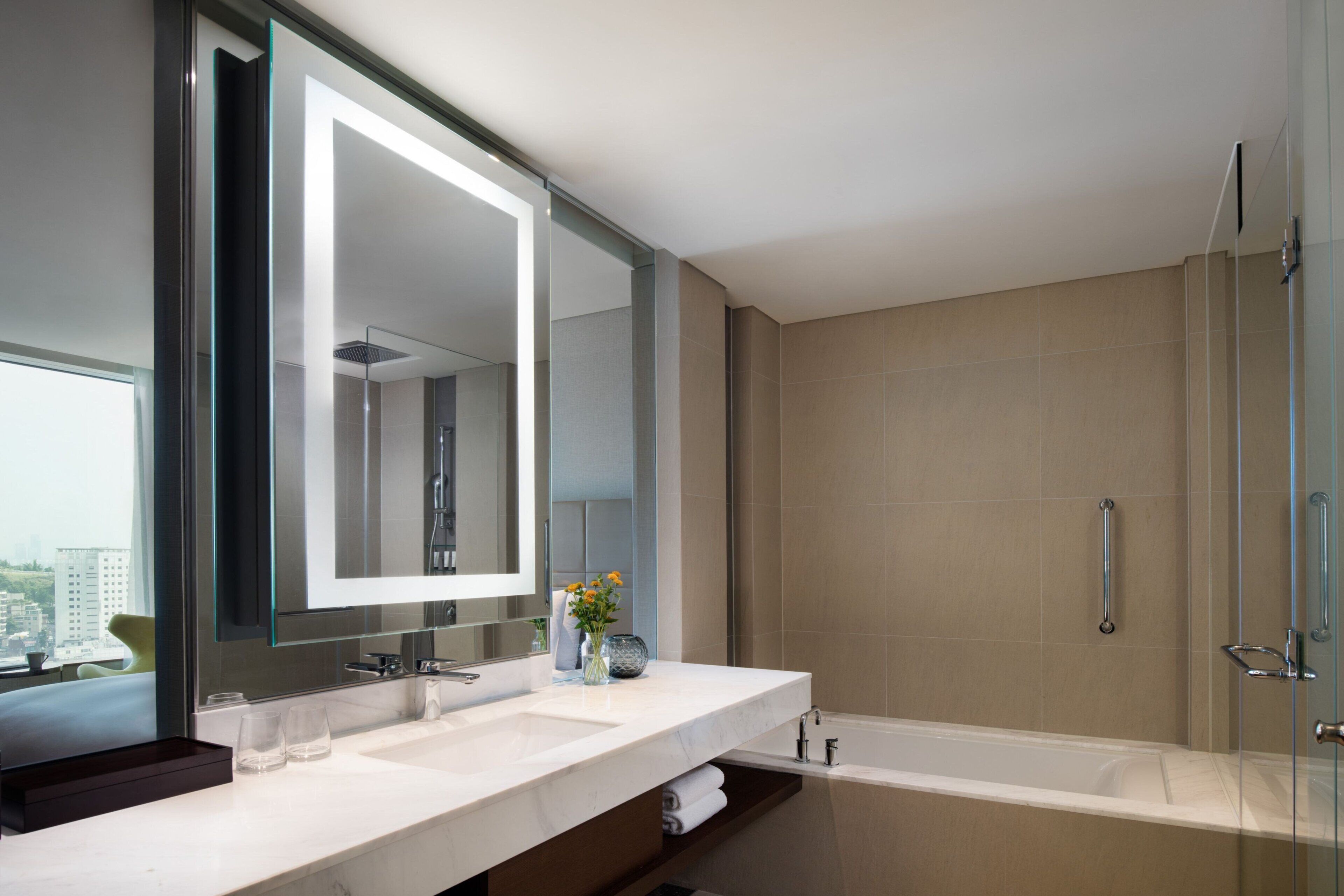 hair dryer, bathrobes, slippers, towels