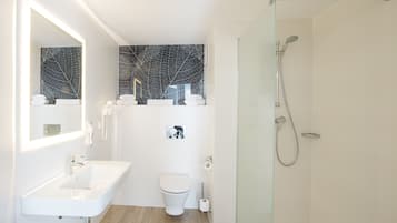 Shower, eco-friendly toiletries, hair dryer, towels