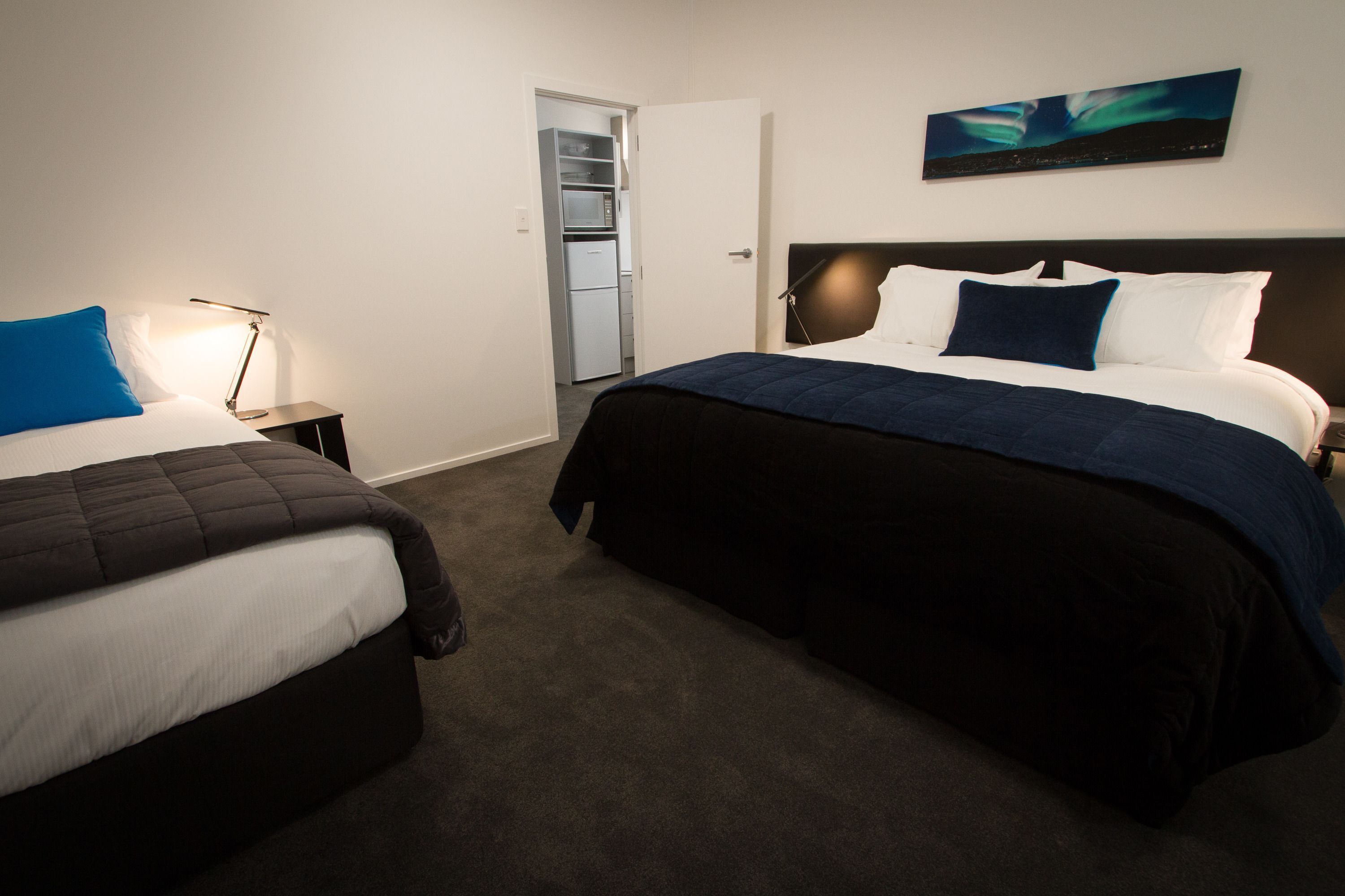 Premium bedding, pillow-top beds, desk, blackout curtains