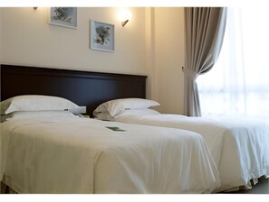 Luxe beddengoed, een bureau, extra bedden, gratis wifi