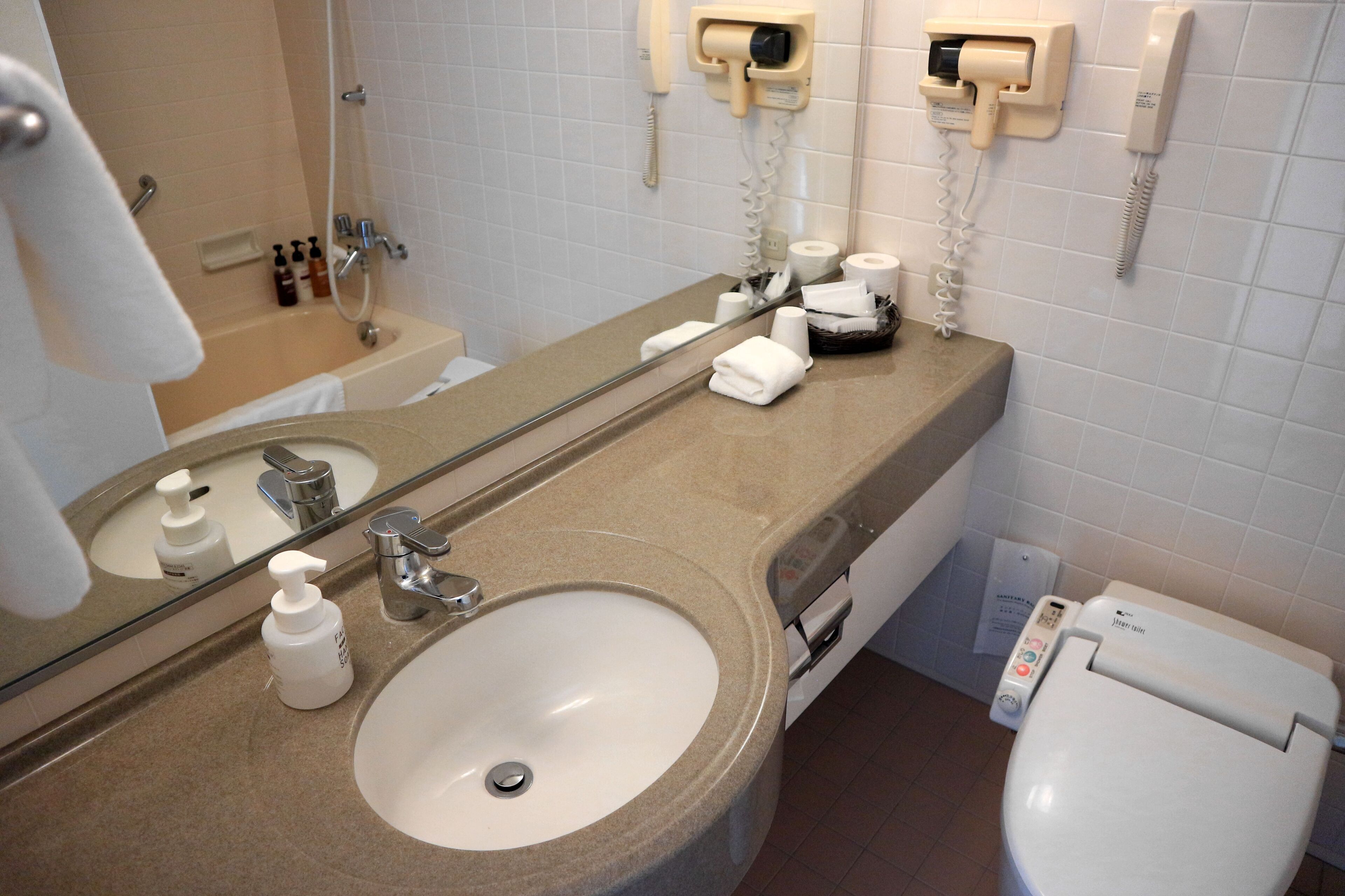 combined shower/bathtub, deep-soaking bathtub, free toiletries