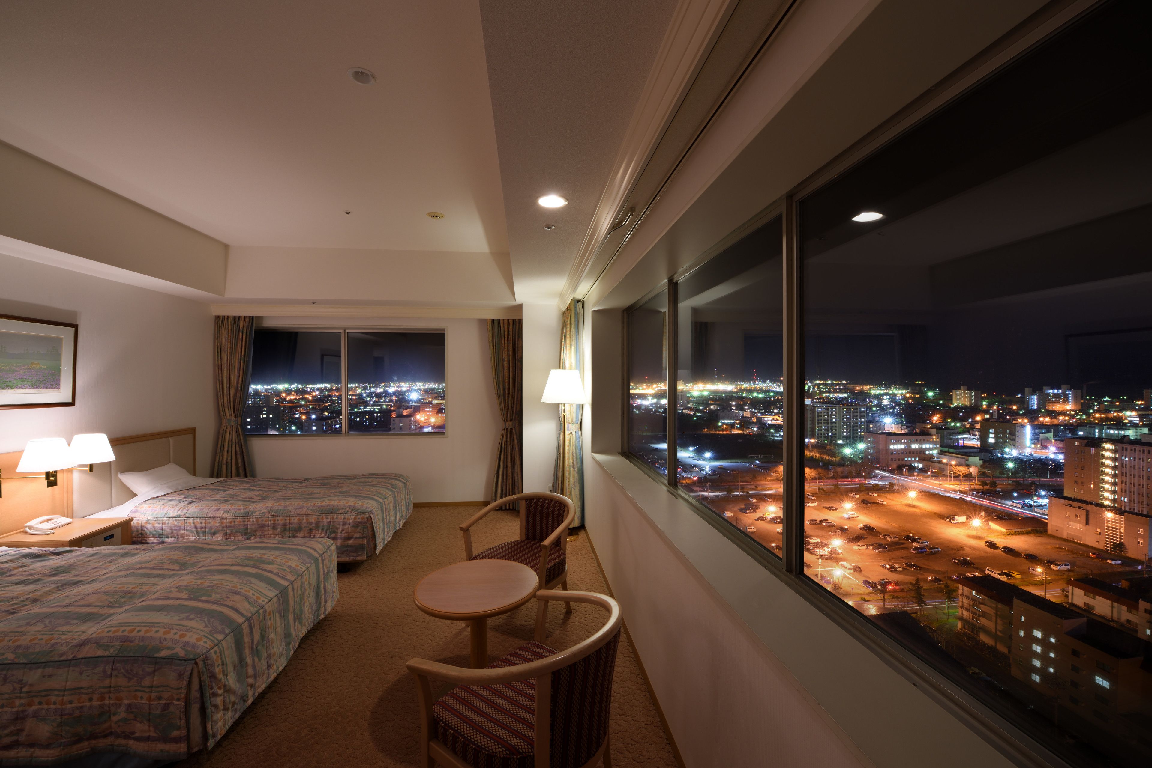 desk, laptop workspace, iron/ironing board, cots/infant beds