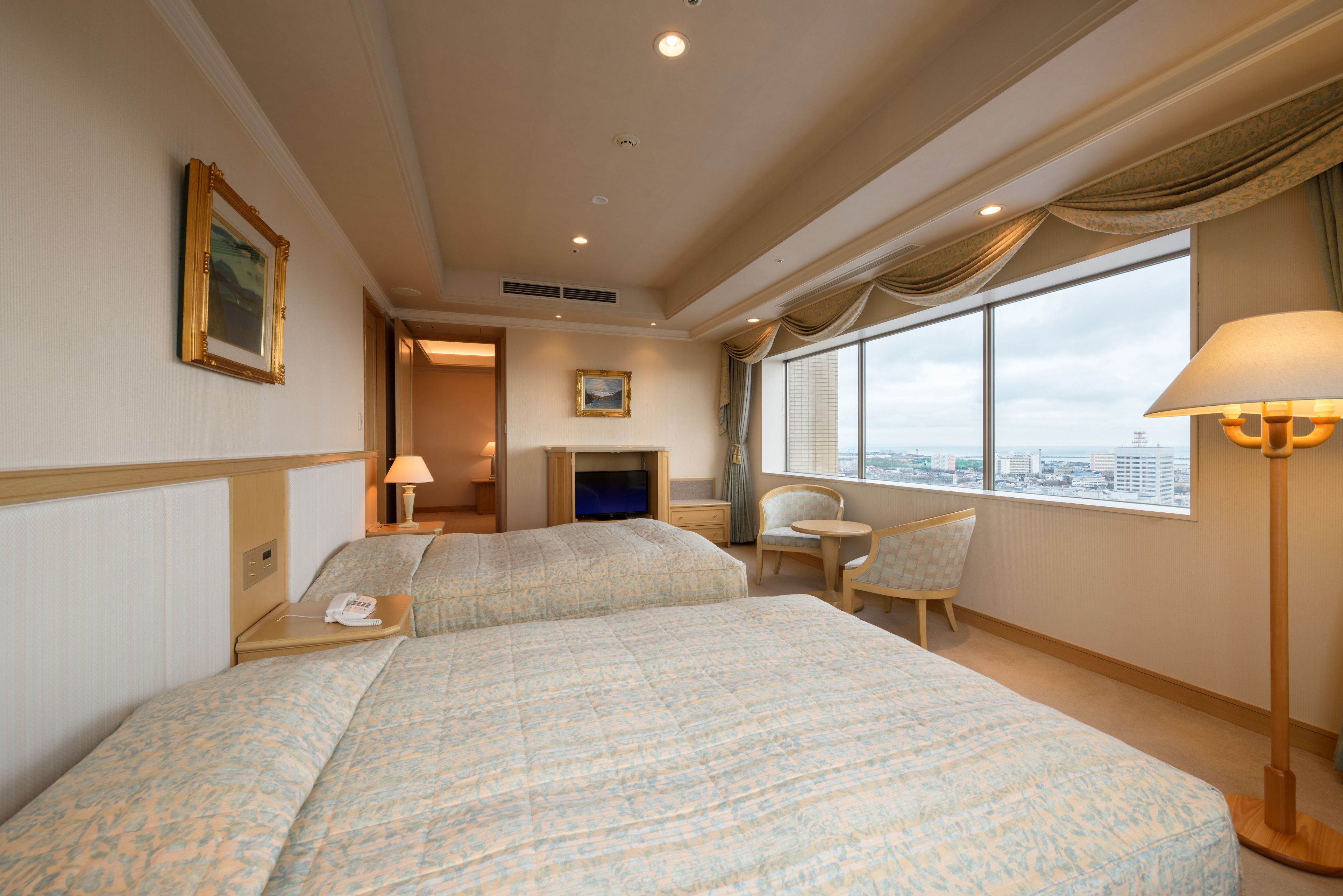 desk, laptop workspace, iron/ironing board, cots/infant beds