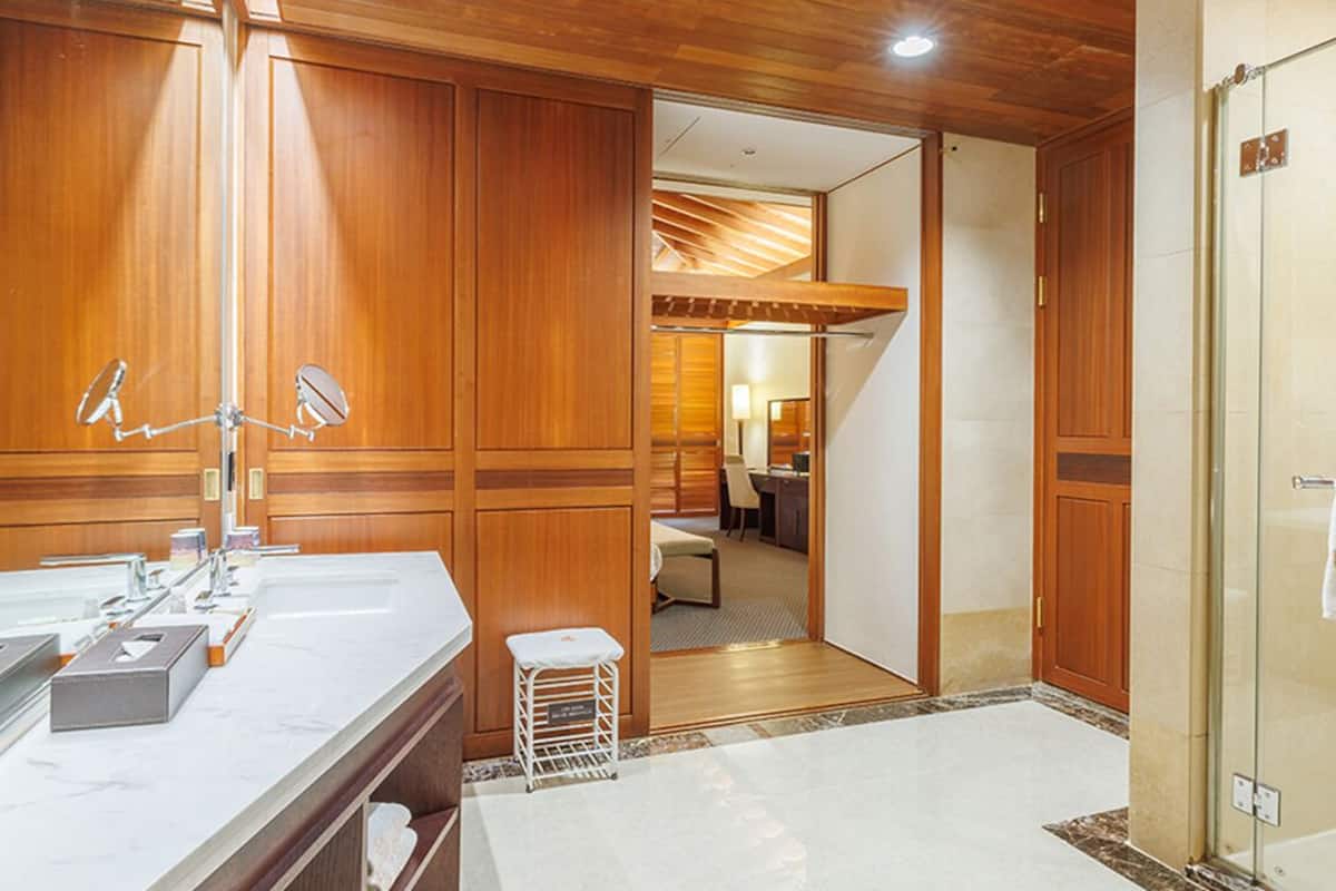 separate bathtub and shower, designer toiletries, hair dryer, bathrobes