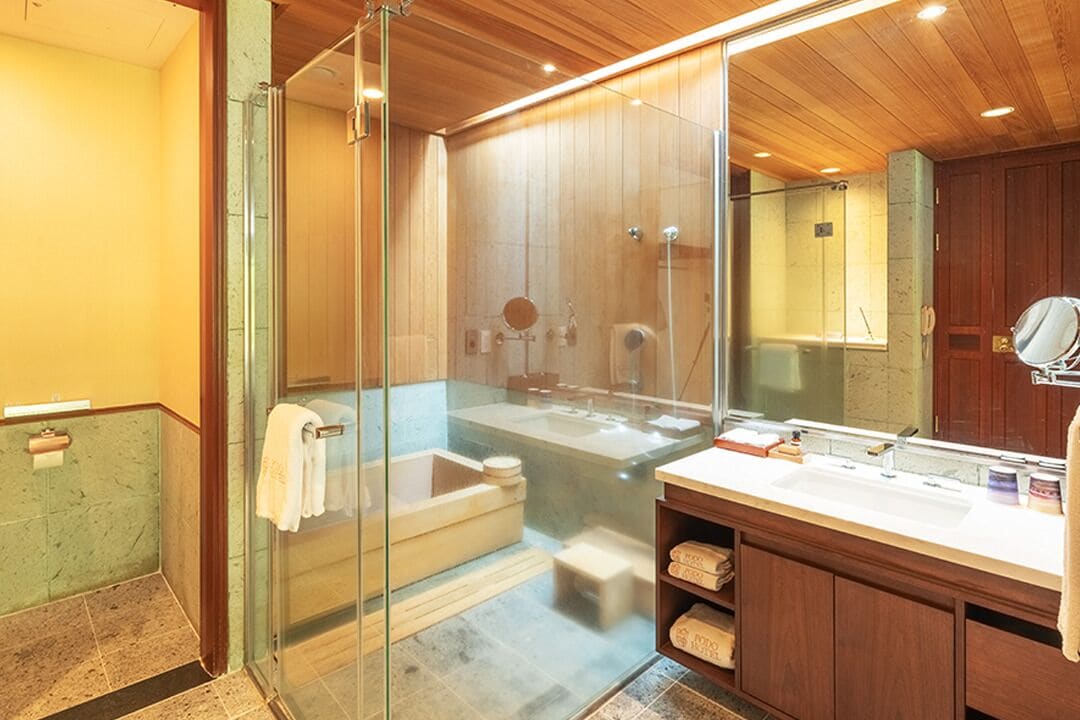 separate bathtub and shower, designer toiletries, hair dryer, bathrobes