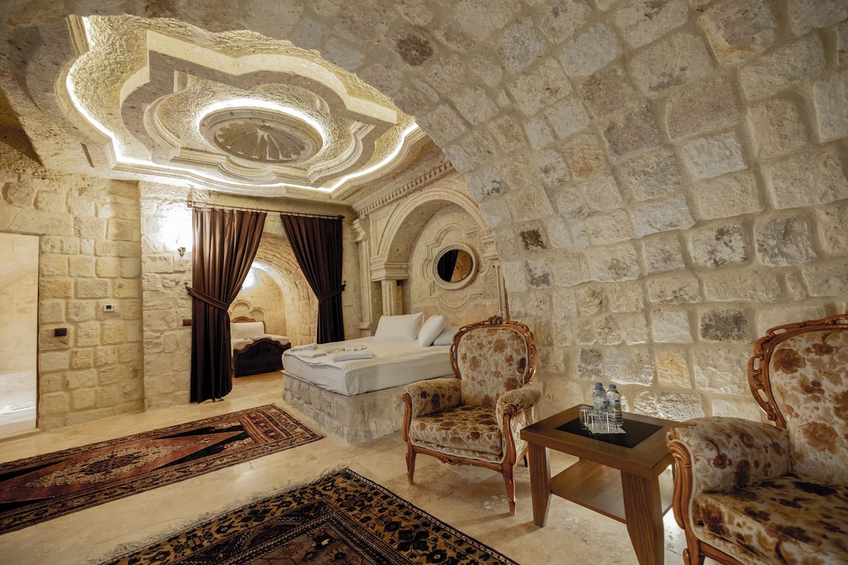 Grand Triple Room | 1 bedroom, in-room safe, individually decorated, individually furnished