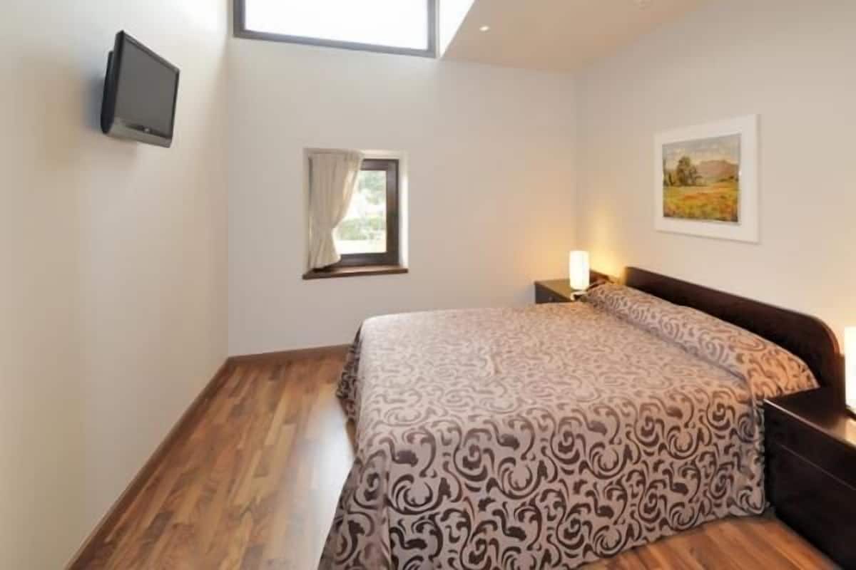 Desk, blackout drapes, soundproofing, iron/ironing board
