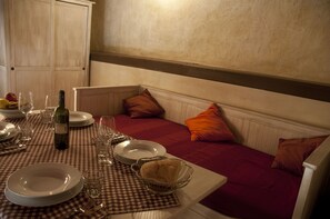 Apartment, 1 Bedroom, Patio | Dining | Breakfast, lunch, dinner served; Italian cuisine