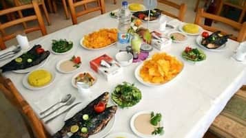 Breakfast, lunch, dinner served; local cuisine