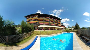 Outdoor pool, pool umbrellas, sun loungers