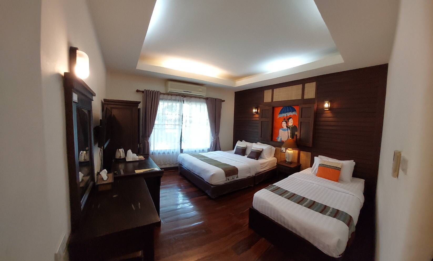 Deluxe Triple Room | Minibar, blackout drapes, free WiFi, bed sheets