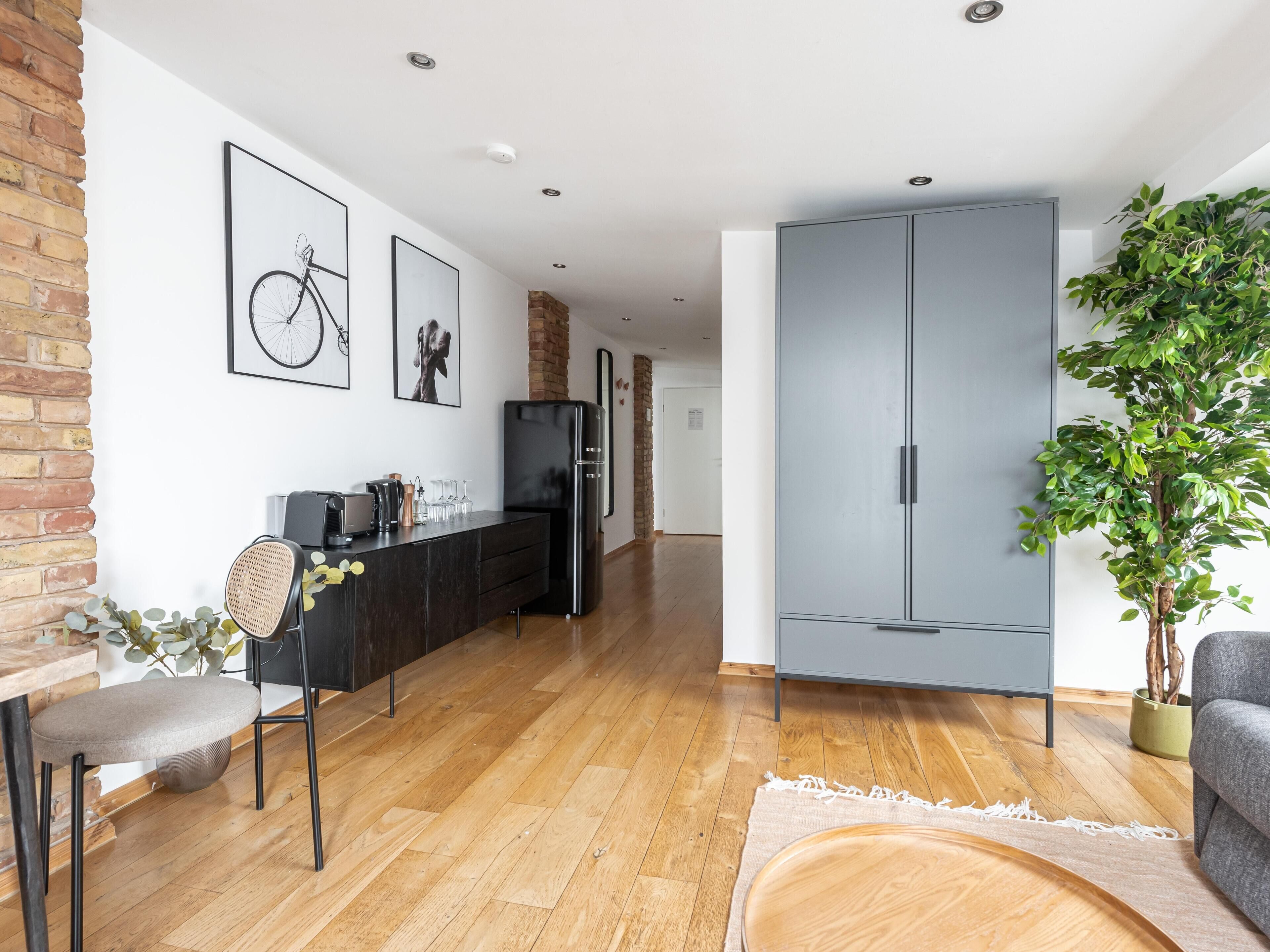 Loft with Rooftop Terrace | Área de sala de estar | Televisión de pantalla plana y reproductor de DVD 