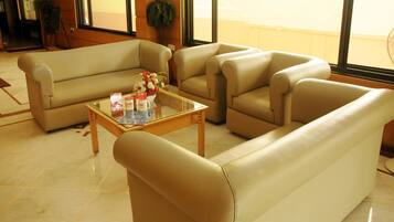 Standard Double or Twin Room, 1 Double Bed, Private Bathroom | Living area | Flat-screen TV