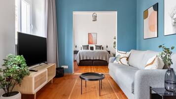 One-Bedroom Suite XL | Living area | Flat-screen TV, DVD player