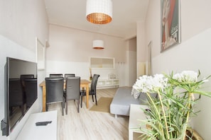 Apartment (Wedding 9) | Living room | 42-inch flat-screen TV with cable channels, TV, DVD player