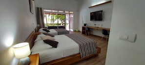 Deluxe Quadruple Room, Ocean View | Premium bedding, in-room safe, desk, laptop workspace - Cahuita Inn (Cahuita)