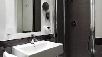 Shower, free toiletries, hair dryer
