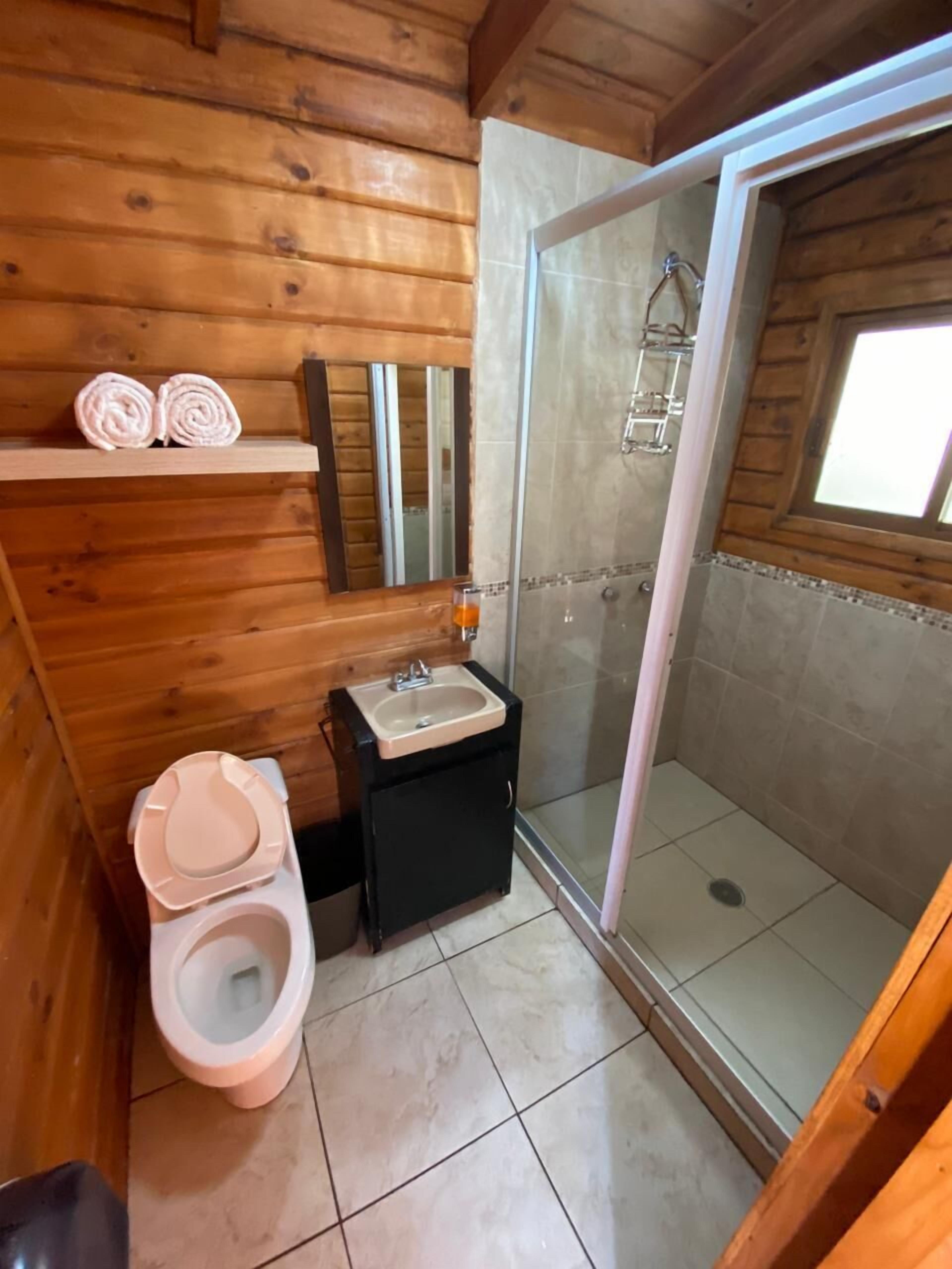 traditional cabin | bathroom | shower, rainfall showerhead, free toiletries