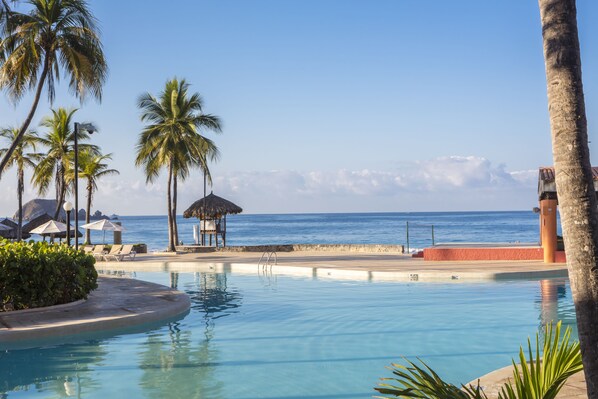 2 outdoor pools, open 8:00 AM to 8:00 PM, pool umbrellas, sun loungers