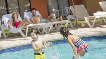 Relax by the pool with lounge chairs and a clear view of the surrounding area.