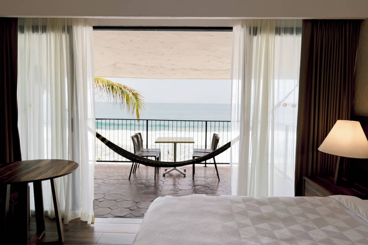 Standard Room, 1 King Bed, Oceanfront | In-room safe, desk, blackout drapes, iron/ironing board