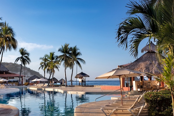 2 outdoor pools, open 8:00 AM to 8:00 PM, pool umbrellas, sun loungers