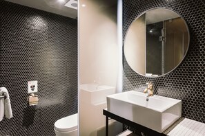 Shower, hair dryer, slippers, towels