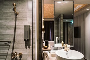Shower, hair dryer, slippers, towels