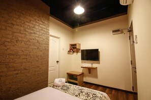 Blackout curtains, iron/ironing board, free WiFi, bed sheets