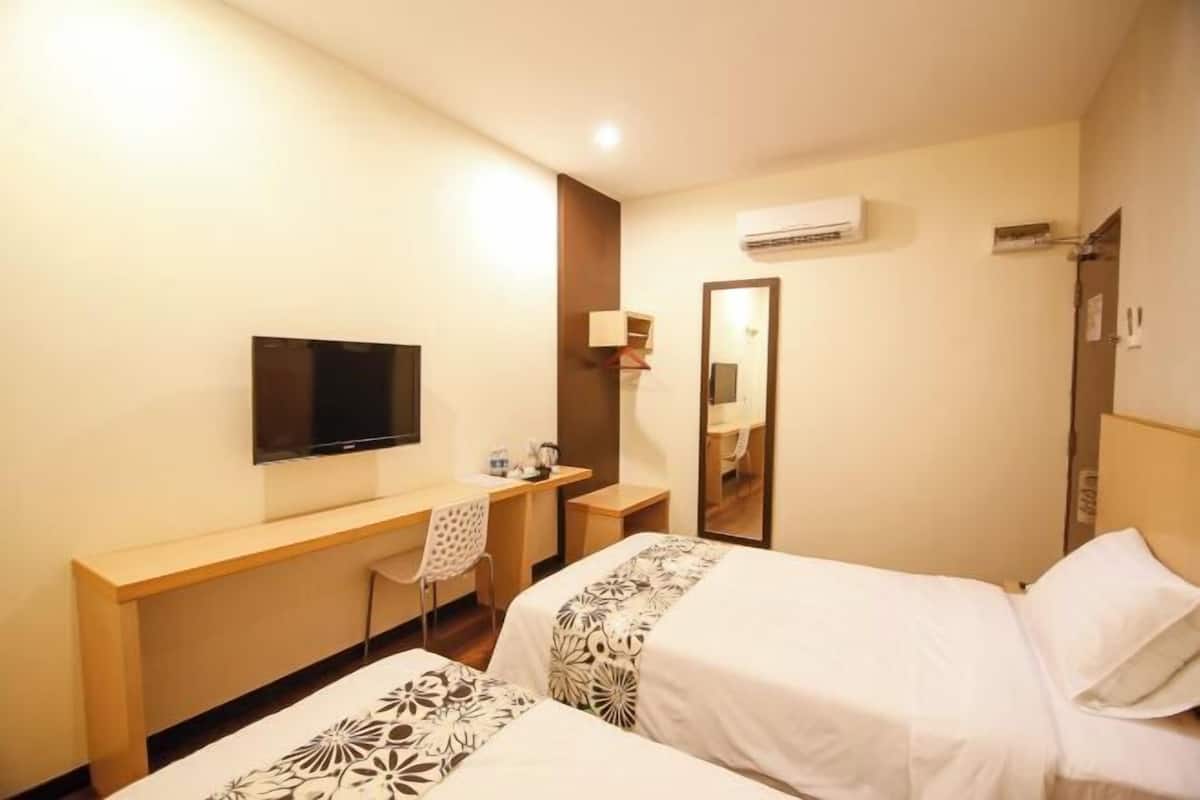 Blackout drapes, iron/ironing board, free WiFi, bed sheets