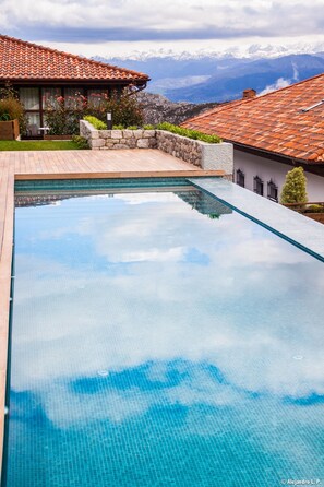Outdoor pool, pool umbrellas, pool loungers