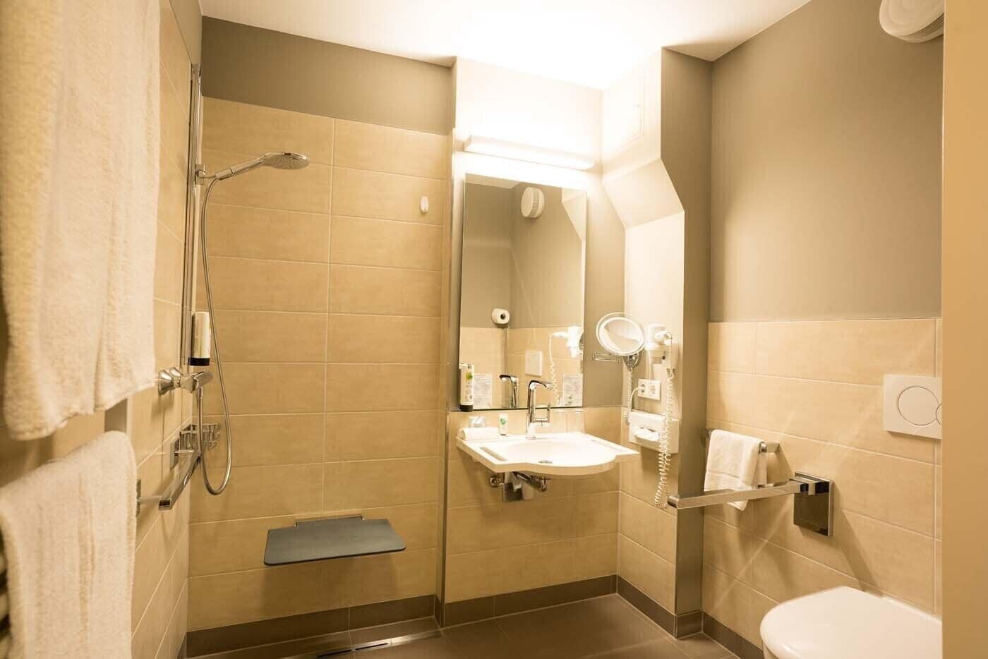 eco-friendly toiletries, hair dryer, towels