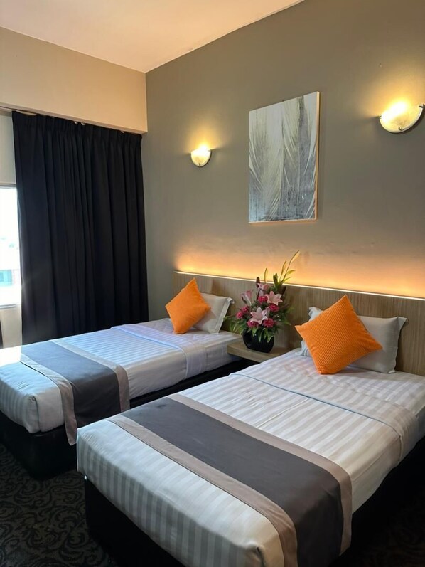 Marigolds Deluxe Room | Desk, free WiFi