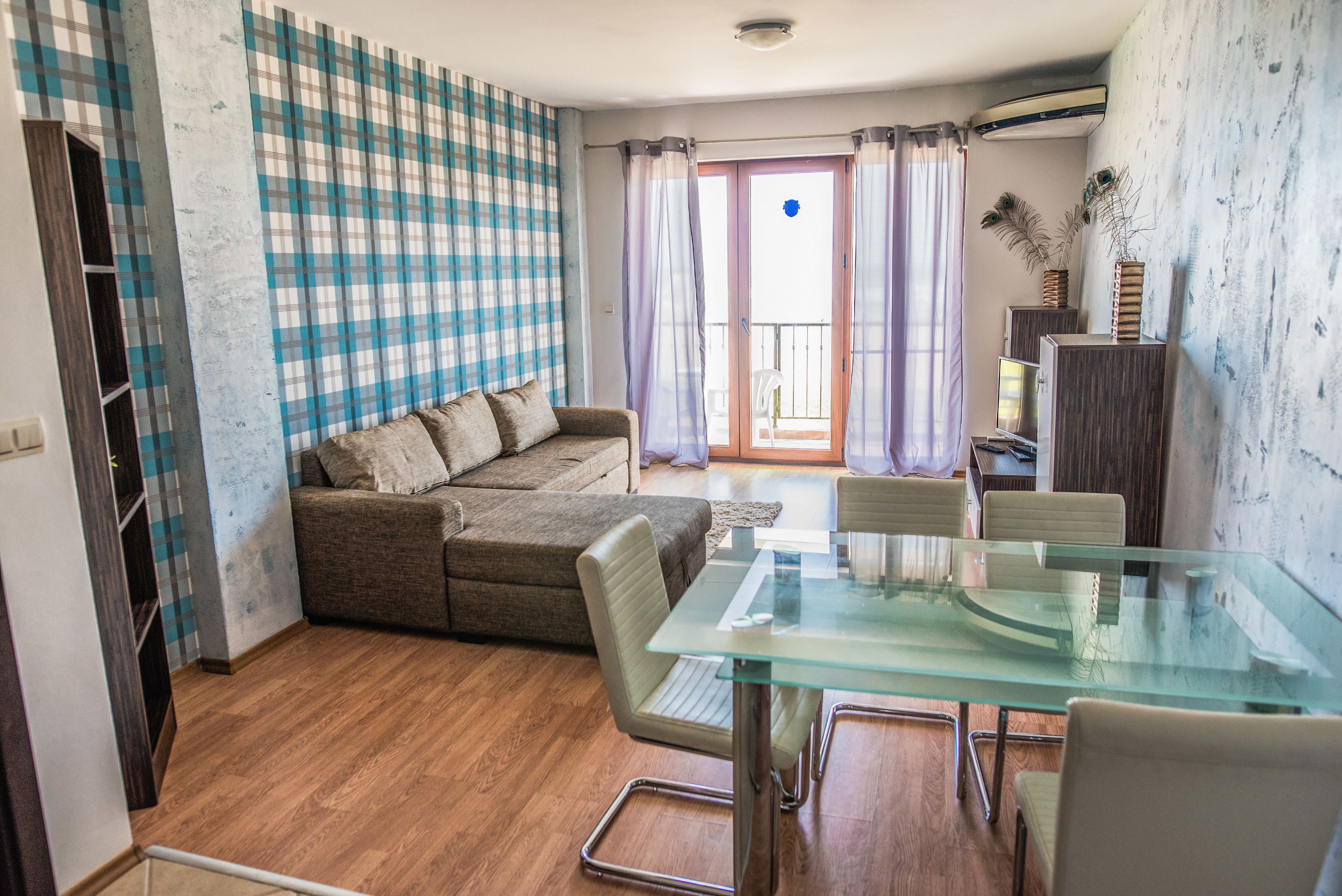 apartment, 1 bedroom, sea view | living room | tv