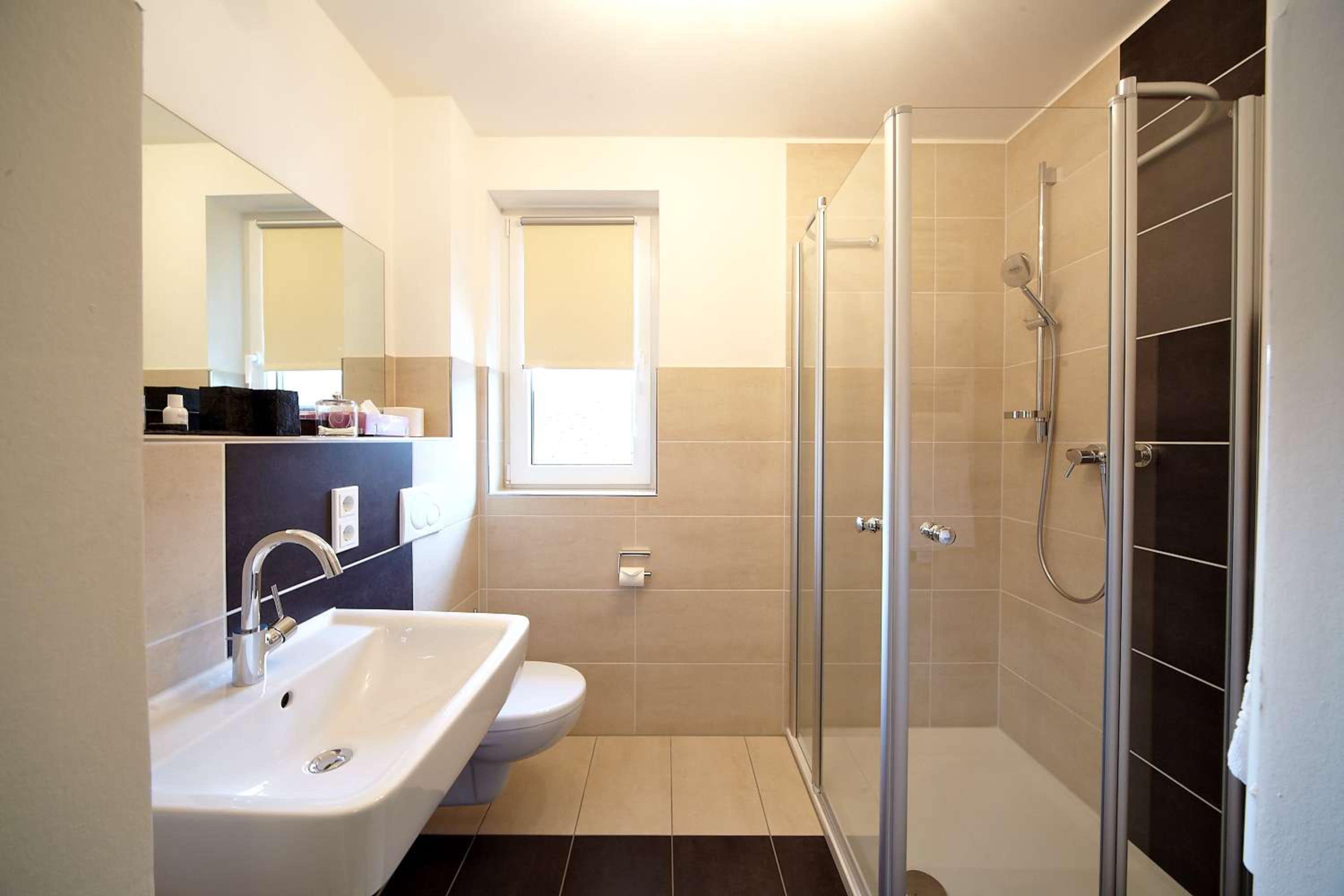 shower, rainfall showerhead, free toiletries, hair dryer