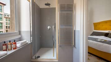 Shower, free toiletries, hair dryer, slippers