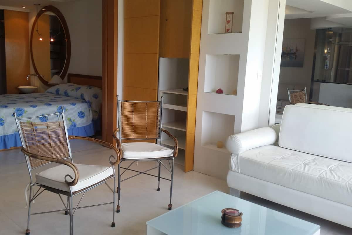 Standard Apartment, 1 Bedroom, Partial Sea View | 1 bedroom, free WiFi, bed sheets