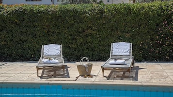Outdoor pool, pool umbrellas, pool loungers