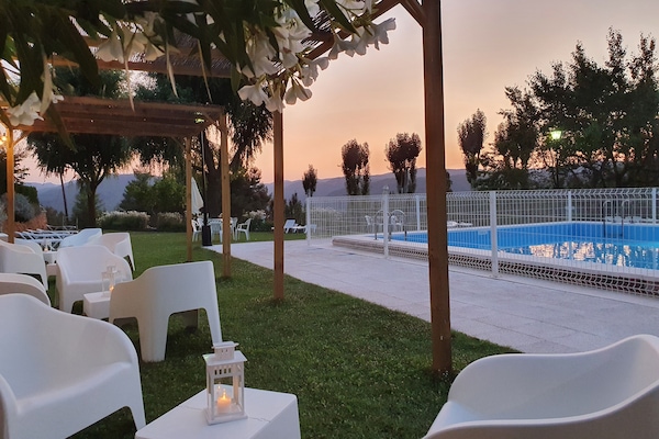 Outdoor pool, pool umbrellas, pool loungers