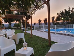 Outdoor pool, pool umbrellas, pool loungers